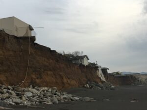 homes falling off a cliff